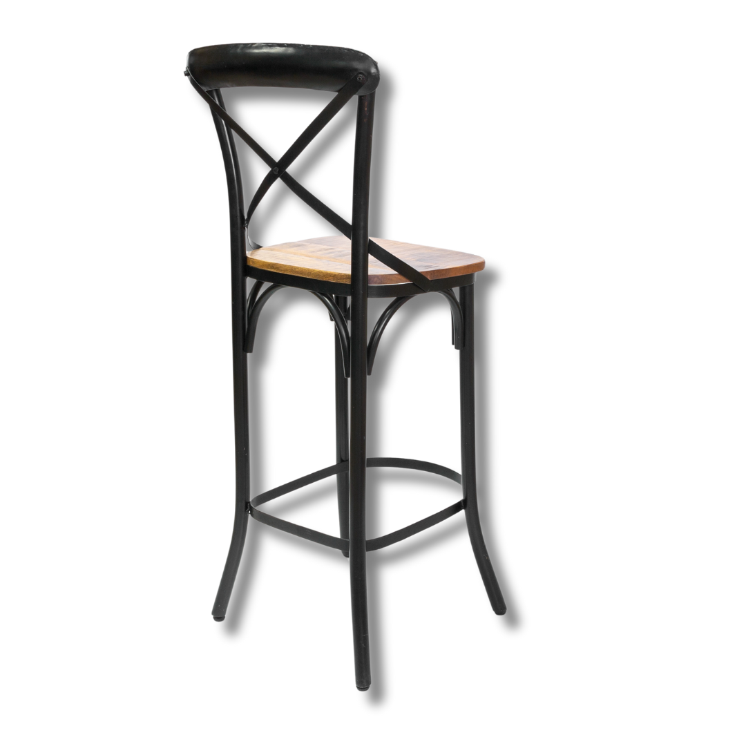 An elegant bar chair with a black frame, wooden seat and backrest with ornate metal detailing.