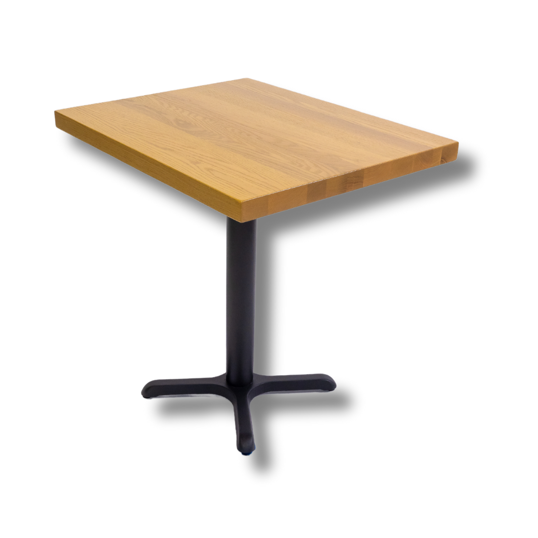 A square wooden tabletop with a light finish mounted on a black four-pronged metal pedestal base, presented against a dark background.