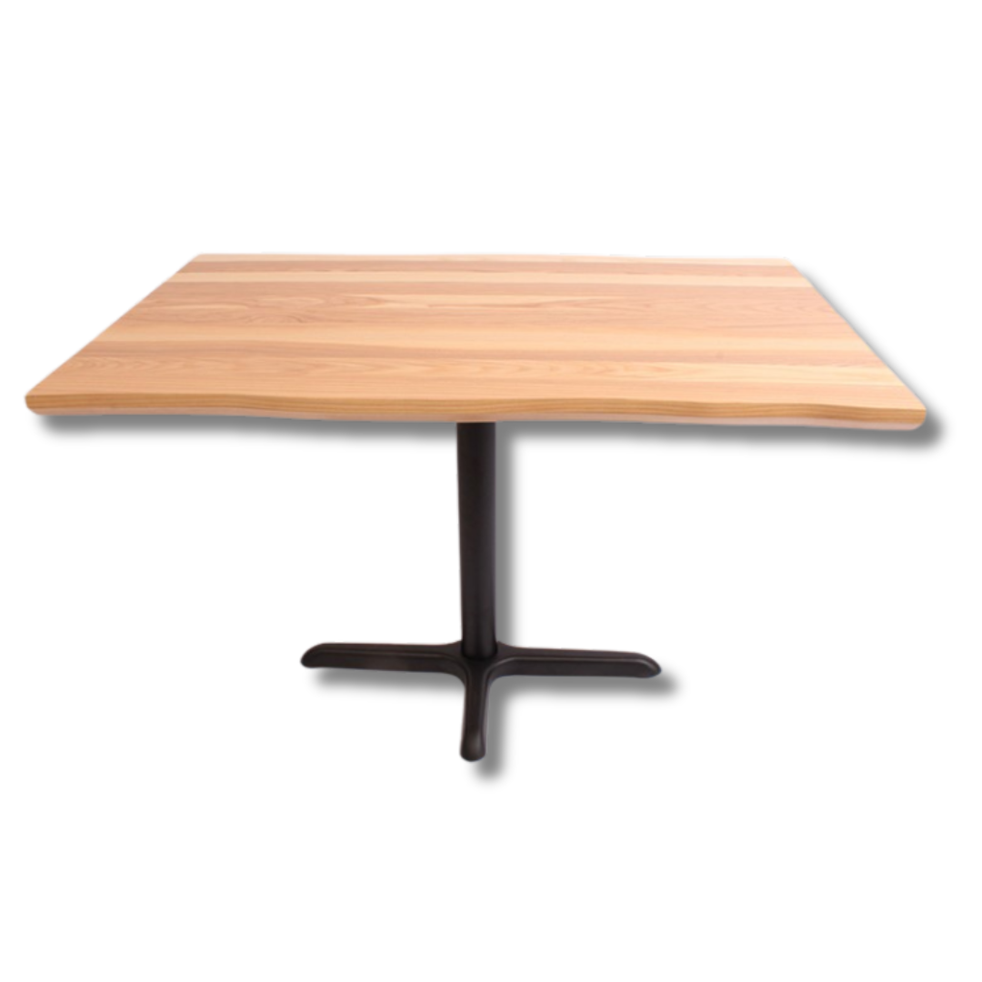 A clean, contemporary light walnut wooden table with a live edge and round, black metal pedestal base